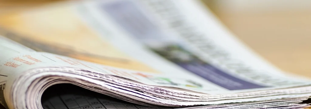 Free newspaper table closeup image